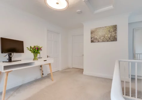 The first floor landing, with workspace, at 1 Cobbs Well, Fowey