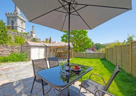 The patio, alfresco dining area & encloed garden at 1 Cobbs Well, Fowey