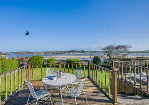 The shared decked patio & alfresco dining area at 1 Pentyre House, Padstow
