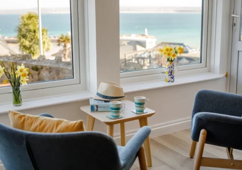 Enjoy far-reaching sea views from the living area at 1 Seabirds House, St Ives
