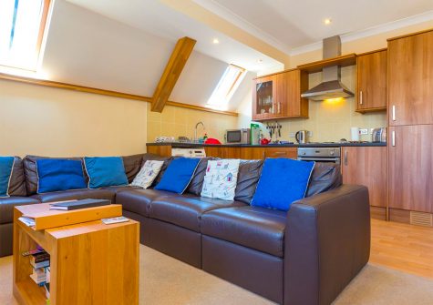 The open-plan living area and kitchen at 10 Jubilee Court, Lynton