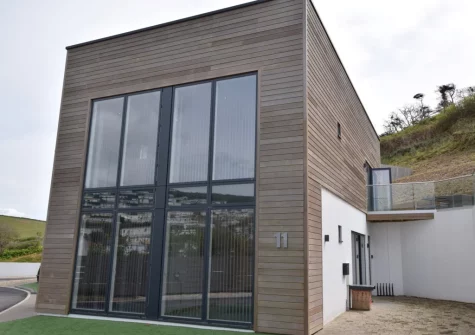 11 Beachdown is a stylish contemporary holiday home with lots of natural light & bi-fold doors onto the terrace