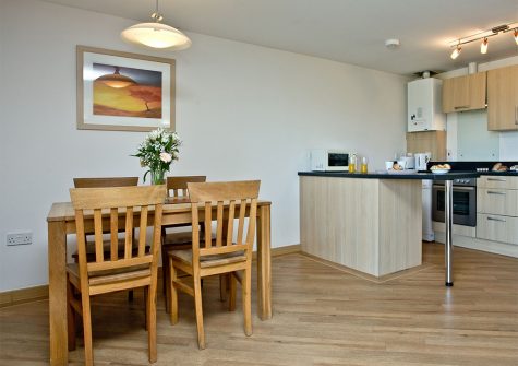 The dining area at 11 Red Rock, Dawlish Warren