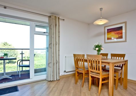 The dining area at 11 Red Rock, Dawlish Warren