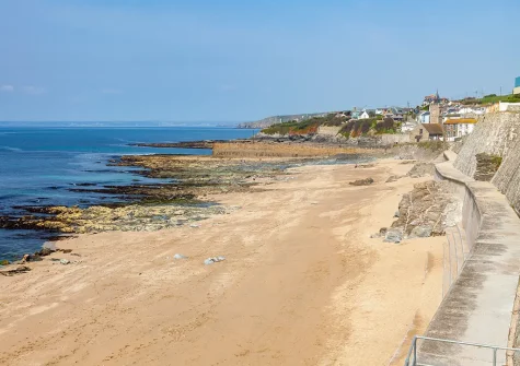 Porthleven Beach offers a long stretch of sand that expands at low tide