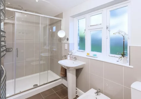 Bedroom #1 en-suite at 2 Bittadon Cottages, Bittadon