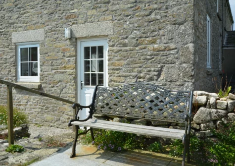 The large patio outdoor sitting area at 2 The Chapel, Rinsey