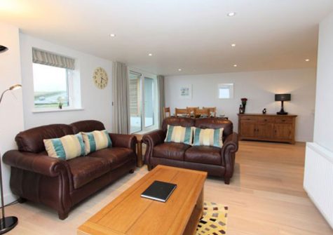 The open plan living and dining area @ 23 Ocean Gate, Newquay