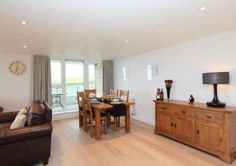 The open plan living and dining area @ 23 Ocean Gate, Newquay