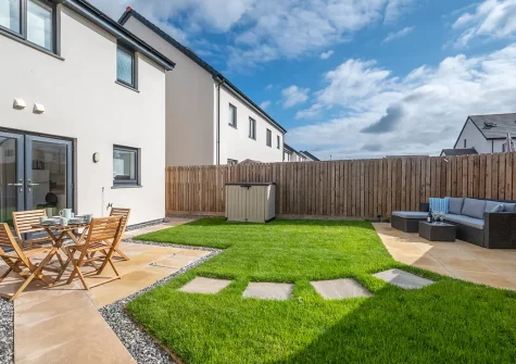 The garden, alfresco dining & outdoor sitting area at 3 Boathouse Terrace, St Eval