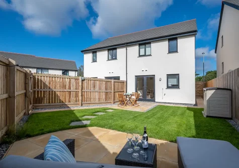 The garden, alfresco dining & outdoor sitting area at 3 Boathouse Terrace, St Eval
