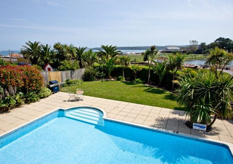 The shared swimming pool & garden at 3 Goodrington Lodge, Paignton