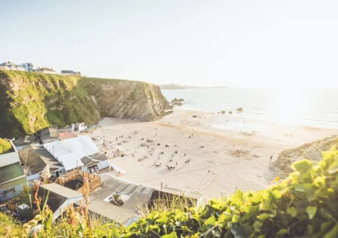 Situated above the iconic Lusty Glaze & Porth Beaches, you're moments away from golden sands, crystal-clear waters & world-class surfing