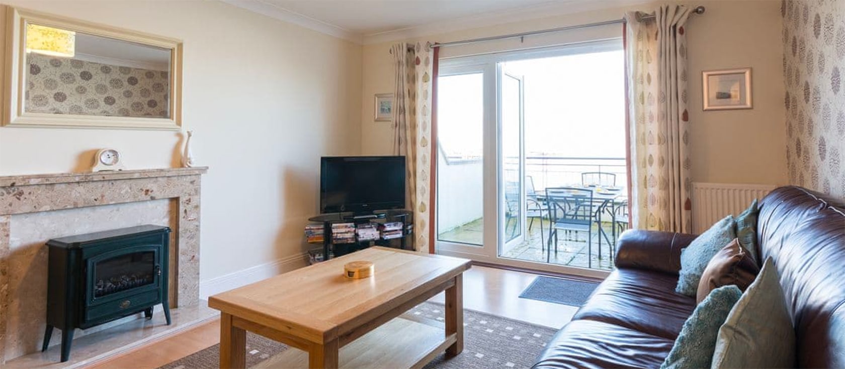 39 Moorings Reach in Brixham is a three bedroom house within an award-winning development. Located alongside Brixham Harbour, it has wonderful views, particularly from the spacious balcony. The property has a fully equipped kitchen and garage parking.