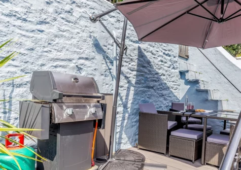 The decked patio, alfresco dining area & barbecue at 4 Rocklands, Brixham