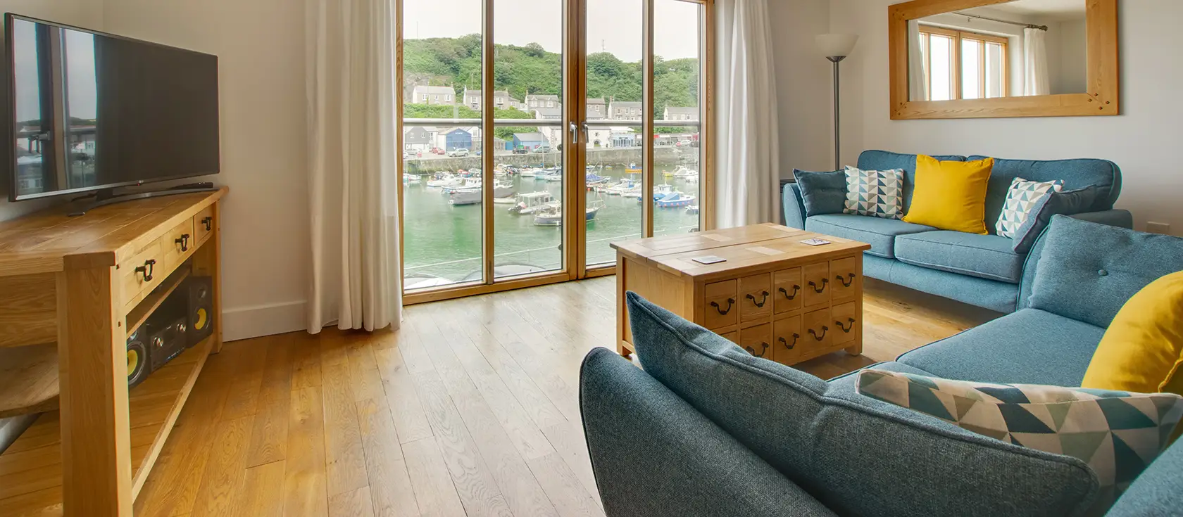4 St Elvans Courtyard, Porthleven is a stylish duplex apartment with stunning harbour views, modern amenities, and coastal charm. Perfect for families seeking Cornwall's natural beauty, Porthleven's character, and memorable seaside holidays.