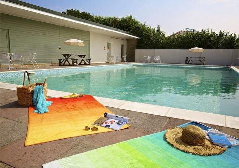 The outdoor swimming pool at Hillfield Village, Bugford