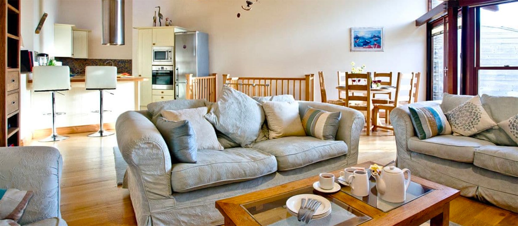 4 Fish Cellars is part of a collection of houses, clad in the original old stone from the village's 400 year old Fish Cellars. Spread over three floors, the property is built using modern eco-friendly methods with state of the art design features.