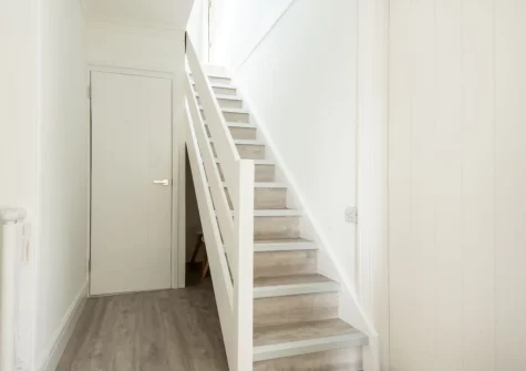 The stairs up to the second floor at 4 Tywarnhayle Square, Perranporth
