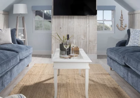 4 Tywarnhayle Square, Perranporth is a stylish three-storey apartment moments from the golden sands of Perranporth Beach, featuring contemporary coastal interiors, flexible family sleeping, and a prime location in this North Cornwall surf town.