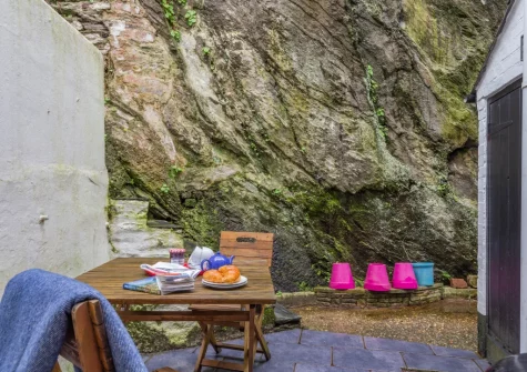 The rear paved courtyard & outdoor sitting area at 45 North Street, Fowey