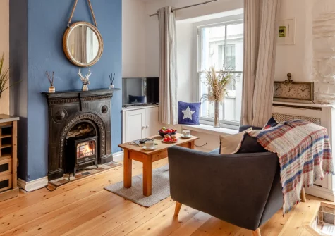 45 North Street, Fowey is a charming two-bedroom cottage in the heart of this historic harbour town, boasting a peaceful rear courtyard, traditional Cornish character, and stunning coastal walks right on your doorstep just metres from the water.