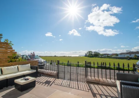 The enclosed front terrace & outdoor sitting area at 5 Coastguard Cottages, Torquay