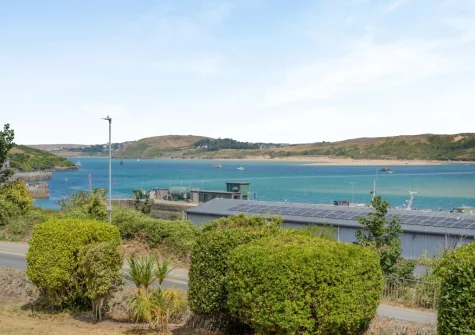 Enjoy views of the estuary from the shared decked terrace, alfresco dining & outdoor sitting area