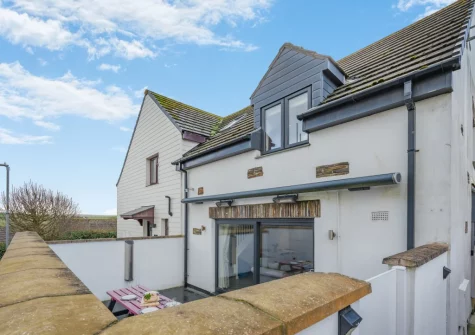 50 Padstow is a thought-out, stylish property with a contemporary vibe & private parking within walking distance of harbour & beaches