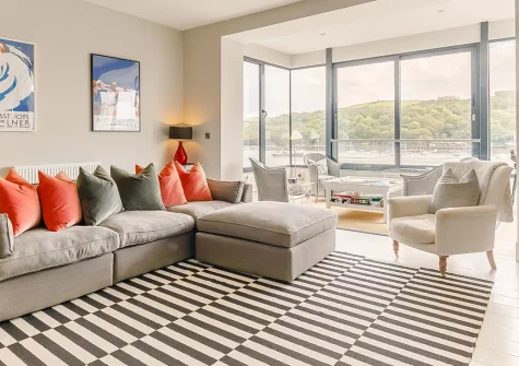 51 Esplanade, Fowey is a stunning four-bedroom waterfront house offering unobstructed harbour and river views. Perfect for families and groups seeking authentic Cornish charm with every modern comfort and direct beach access to explore.