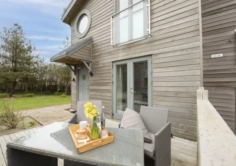 The decked terrace & alfresco dining area at 55 Una, St Ives