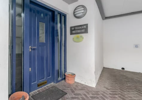 Enter this charming apartment through a private entrance