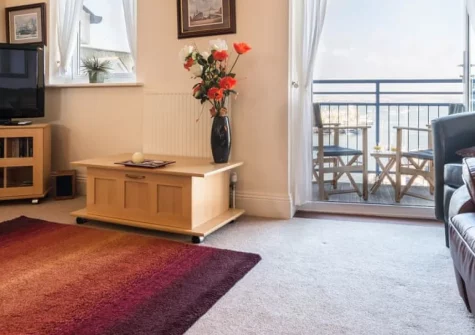 62 Moorings Reach, Brixham is a spacious three-bedroom marina apartment offering peaceful harbour views from a private balcony, contemporary interiors with lift access, and a waterfront location just moments from Brixham's restaurants & attractions.