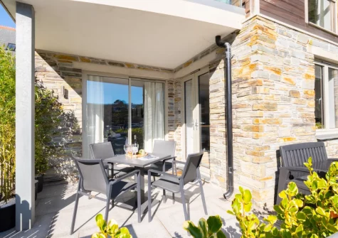The covered patio & alfresco dining area at 7 The Old Station Master's House, Fowey