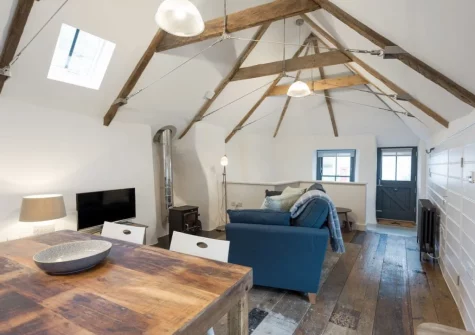 The living & dining area at 9 Chapel Street, Mousehole
