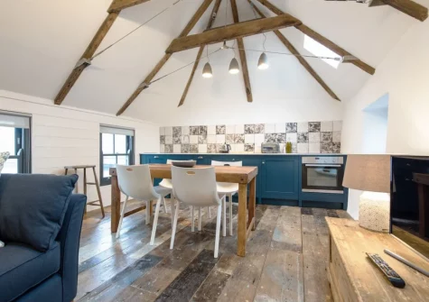 The dining area & kitchen at 9 Chapel Street, Mousehole