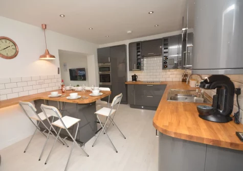 The kitchen & breakfast bar dining area at A Rare Old Station, Appledore