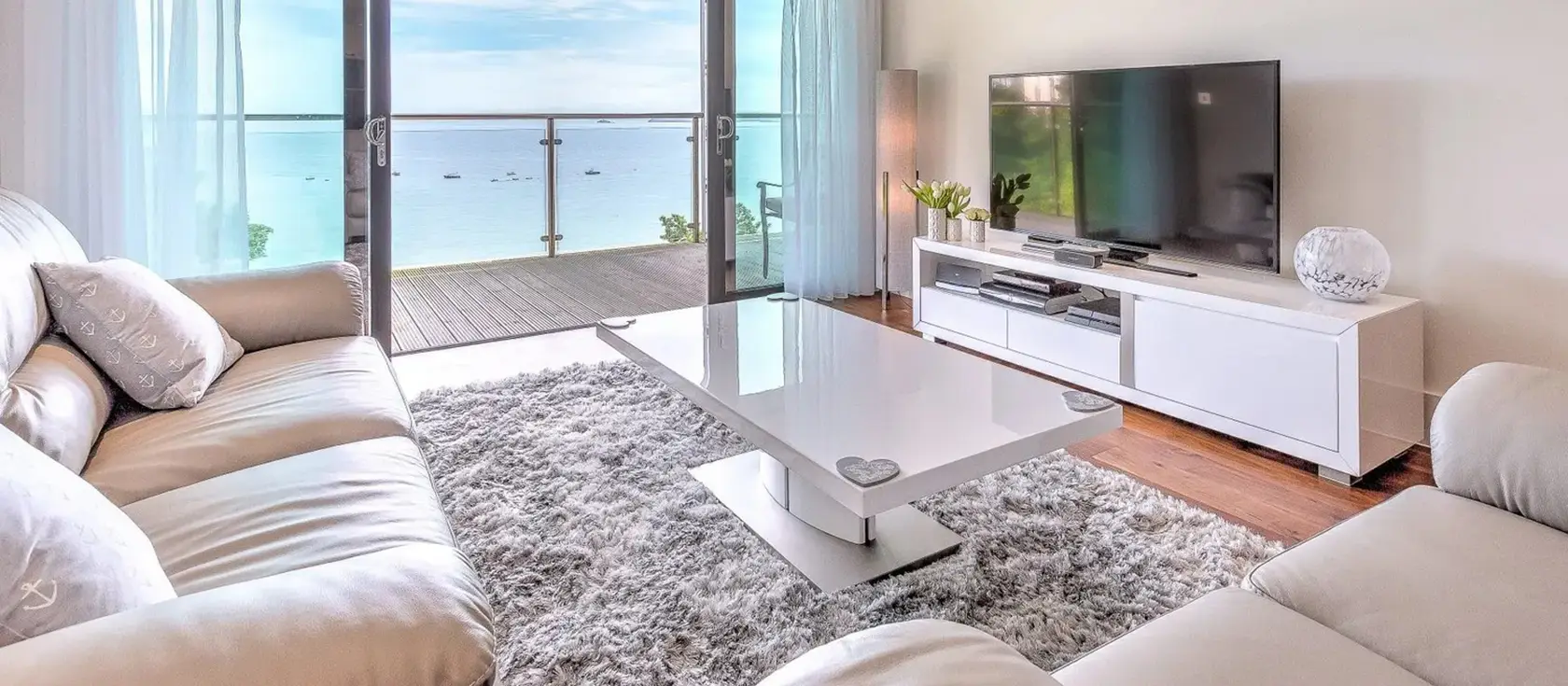 Abalone, St Ives is a stunning two-bedroom seafront apartment offering breathtaking panoramic ocean views over Porthminster Beach. Enjoy stylish contemporary interiors, modern amenities, and a private seaward balcony perfect for relaxation.