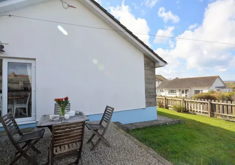 The patio, alfresco dining area & garden at Aglets Cottage, Bude