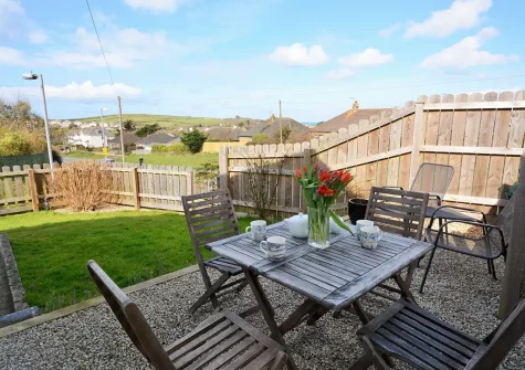 The patio, alfresco dining area & garden at Aglets Cottage, Bude