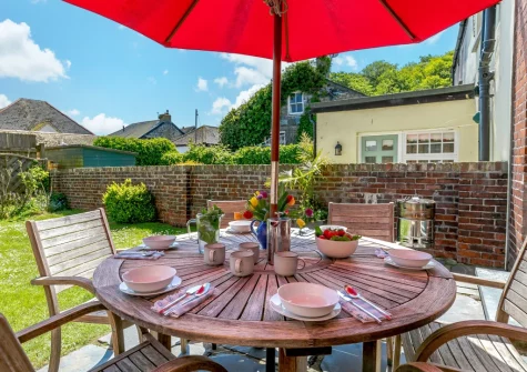 The patio, barbecue & alfresco dining area at Alexandra House, Padstow