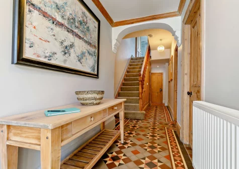The entrance hallway & stairs up to the first floor at Alexandra House, Padstow