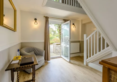 The entrance hallway & stairs up to the first floor at Alminstone House, Woolsery