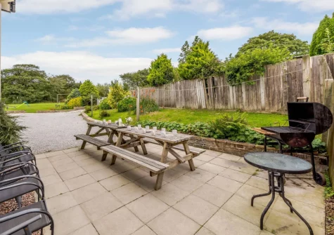 The patio, barbecue & alfresco dining area at Alminstone House, Woolsery