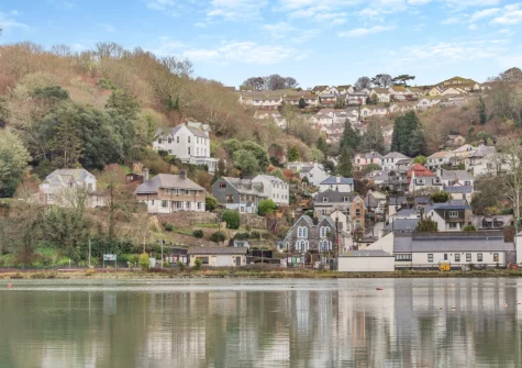 Alvaston is a neat three-storey holiday home tucked into the hillside overlooking the River Looe