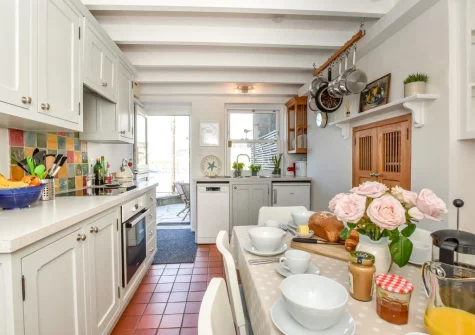 The kitchen & dining area at Amelia Cottage, Polruan