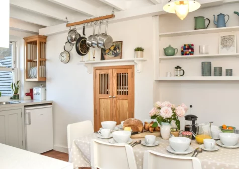 The kitchen & dining area at Amelia Cottage, Polruan