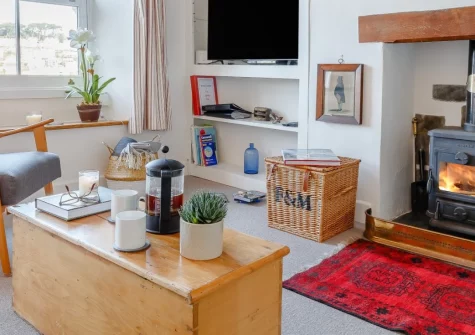 Amelia Cottage, Polruan is a delightful three-bedroom retreat in this charming fishing village, with captivating river views from every window, a private terrace perfect for al fresco dining, & the passenger ferry to Fowey less than 200 metres away.