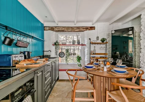 The kitchen & dining area at Amy Jane Cottage, Polruan