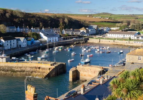 Visit Porthleven, a charming coastal town that offers a picturesque harbour, beautiful beaches & top-notch dining